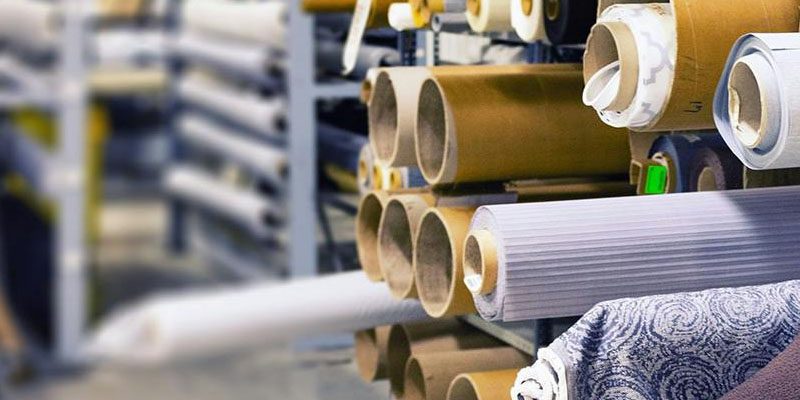 Rotoli di tessuto per la lavorazione industriale.