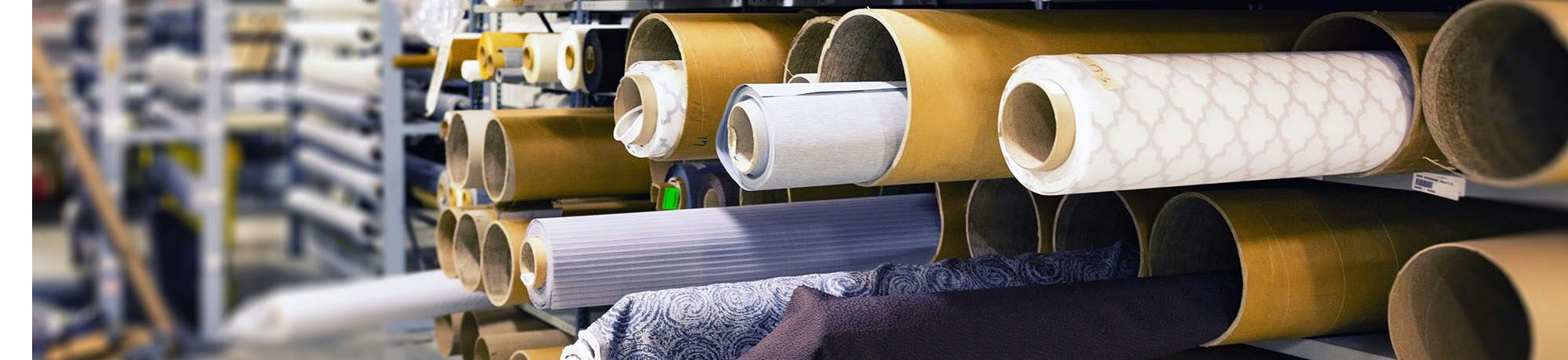 Rotoli di tessuto per la lavorazione industriale.
